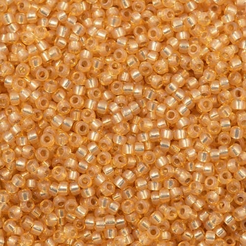 Miyuki Round 0552 Dyed Light Apricot Silver Lined Alabaster